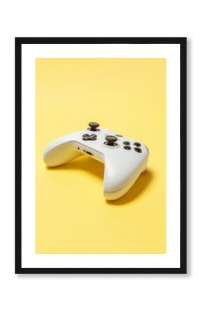White joystick gamepad, game console on yellow colourful trendy modern fashion pin-up background. Computer gaming competition videogame control confrontation concept. Cyberspace symbol