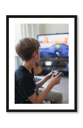 Boy playing video game at TV