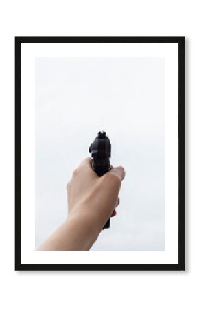 girl shoots a gun from the first person