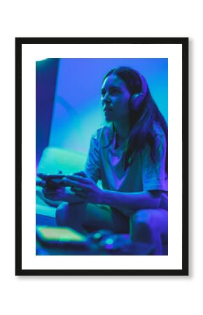 involved gamer girl playing video games on the console on the couch