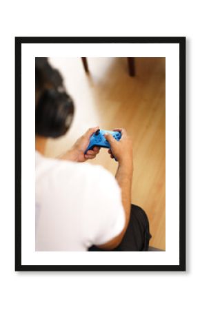 details of hands with the remote control of video games, modern technological gadget for leisure and hobbies, gamer and lifestyle, concept