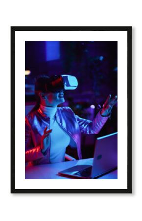 smiling business woman designing metaverse in modern office