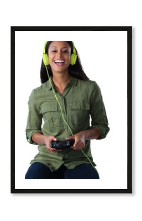 Woman playing video game against white background