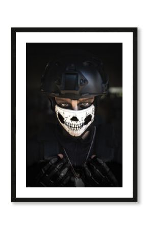 A female cosplayer dressed as a Black Ops Special Forces soldier character