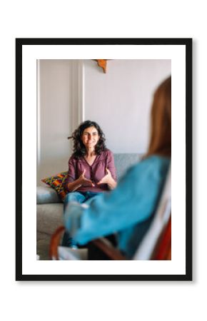 psychology and mental therapy concept - spanish woman patient and psychologist at psychotherapy session