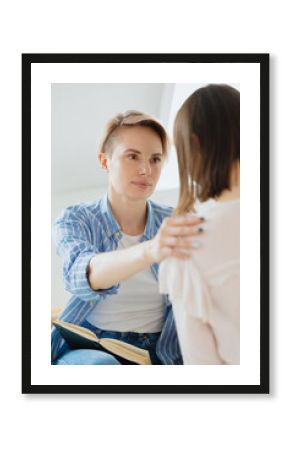 European woman psychologist communicates with a patient, a young adult woman psychotherapy session with a client or support a friend, psychology and mental health care, mental support and care for