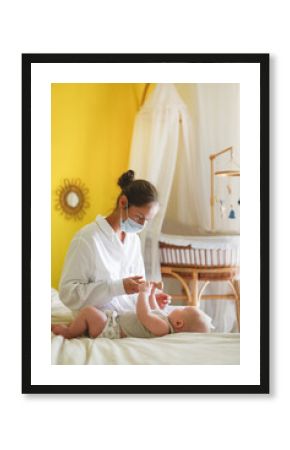 Doctor nurse with a toy with a baby, examination of a baby at home, home nursing. Testing for cognitive, a woman shows a baby a toy and a toddler watches a toy