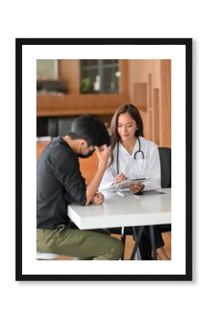 A serious male patient is concerned about his mental illness and is speaking with his female psychologist