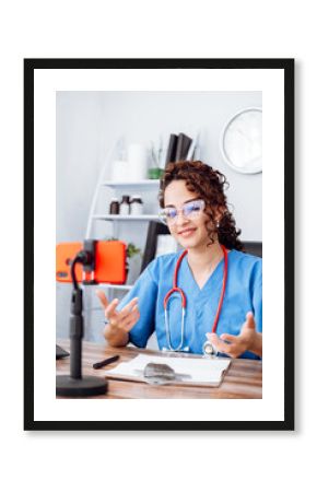 influencer female doctor using her phone making a video, social media and trends concept.