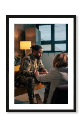 Soldier with psychologist in analysis.