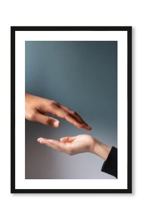 Help Concept hands reaching out to help each other 