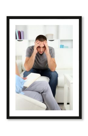 Young man on reception at psychologist