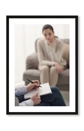 Psychologist listening to her patient