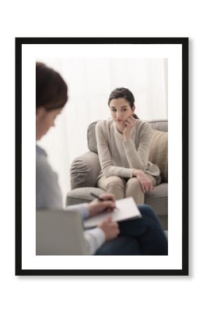 Psychologist listening to her patient