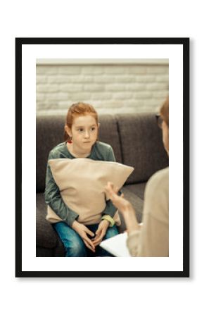 Nice red haired girl having a psychological session