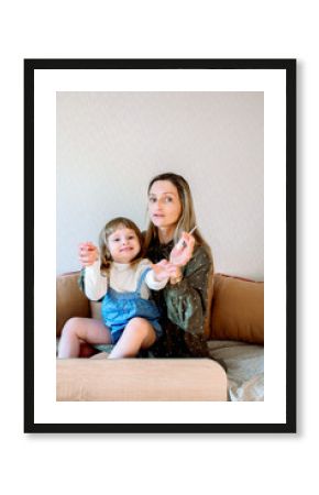 Pediatrician consultation at home, online doctor consultation. mother and naughty baby girl in her arms. Mom's story about the problem. Online call to a doctor, psychologist or lawyer