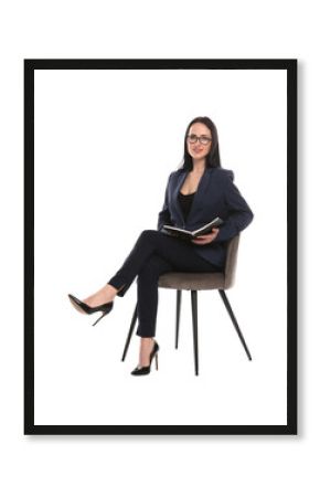 Professional psychologist with notebook in office chair on white background