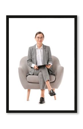 Portrait of female psychologist sitting in armchair on white background