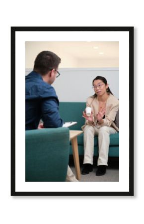 Professional psychologist conducting a consultation.