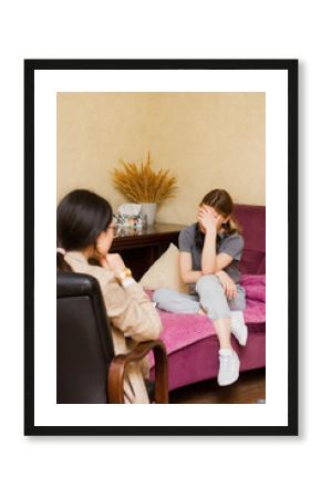 Depressed teenage girl with therapist. Teen during psychologist counseling