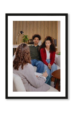 couple of man and woman at psychologist, taking care of mental health in relationship. joint therapy for solving communication problems in family. moral support for young African Americans married