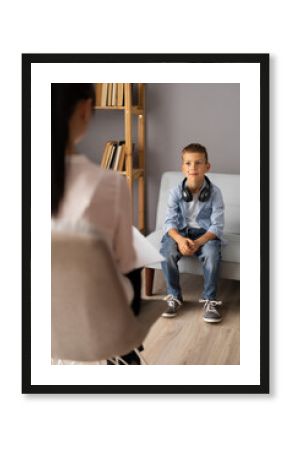 Boy conversation with psychotherapist, therapist counsellor, visit to doctors office. Teen problems