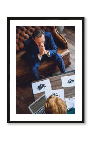 Middle aged man stubbornly thinking