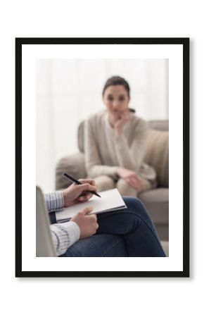 Psychologist listening to her patient