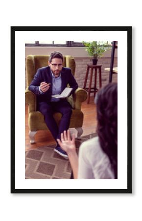 Nice professional psychologist speaking to his patient