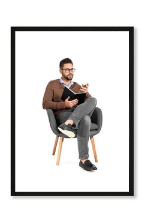 Male psychologist sitting in armchair on white background