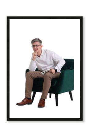 Professional psychologist with notebook sitting on chair against white background