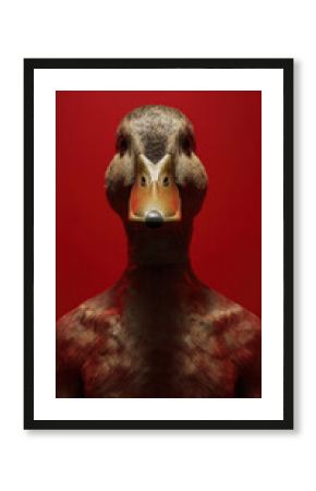 Unique artistic representation of a humanoid figure with a duck head against a bold red background showcasing creativity and imagination