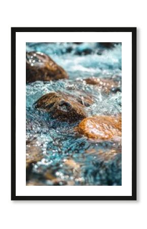 blue water flowing over rocks in a river 