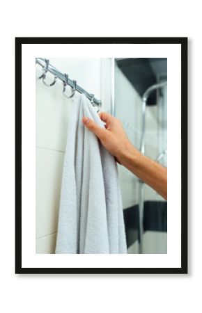 man is holding a towel