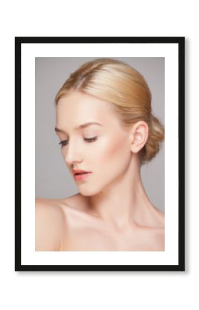 Fashion blonde woman with beautiful face - isolated on white. Skin care concept.