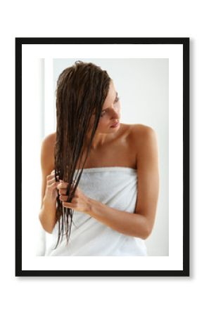 Hair Care. Beautiful Woman With Wet Hair In Towel After Bath