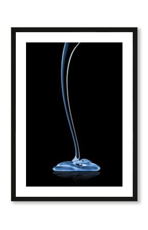 Luminous transparent gel as a drip on black background