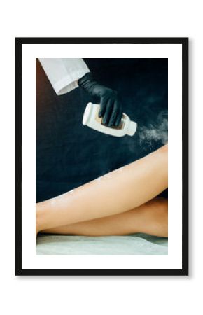 Woman using powder talc for sugaring process