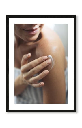 Woman Applying Creme on Body