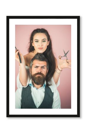 Happy positive woman and bearded man, hairdresser