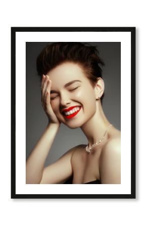 Beautiful girl with set jewelry. Woman in a necklace with a ring, earrings, crown. Accessories. Fashion portrait of young woman with jewelry and elegant hairstyle. Perfect makeup. Beauty style model