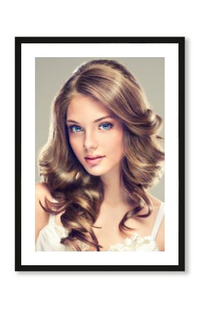 Beautiful young girl with long hairstyle curly hair  