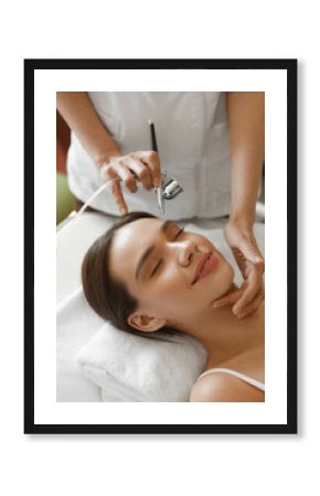 Facial Skincare. Woman Receiving Oxygen Peeling Beauty Treatment