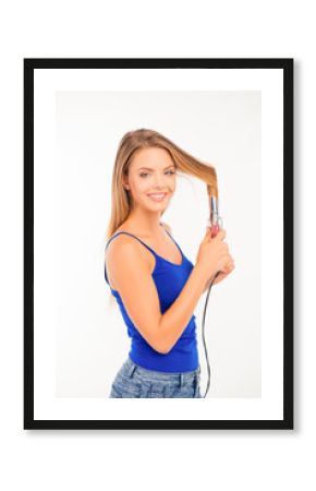 Happy pretty girl twisting her hair