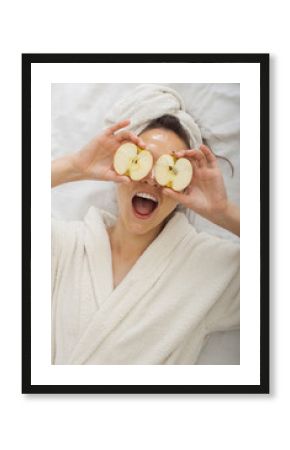 Spa Woman applying Facial honey Mask with apples