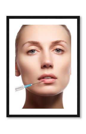 Portrait of young woman getting cosmetic injection. Closeup of beautiful woman gets injection in her face. Filler injections. Lip augmentation. Beautiful perfect lips