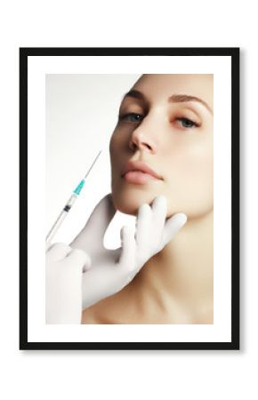 Portrait of young  woman getting cosmetic injection
