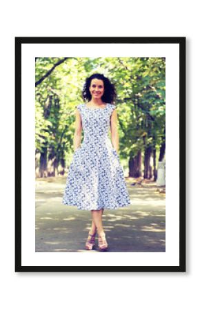 Stylish woman walking down the street