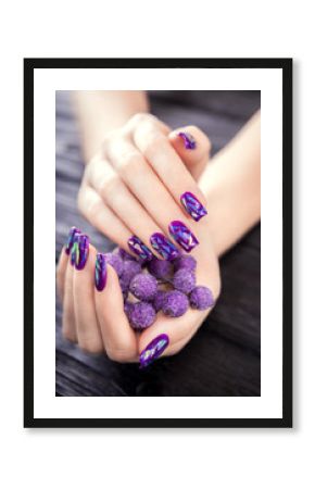Shattered glass purple manicure on black background