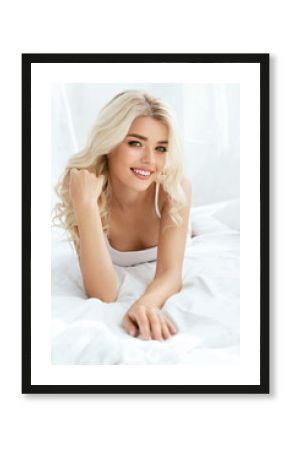 Beautiful Happy Woman On Bed In Light Interior